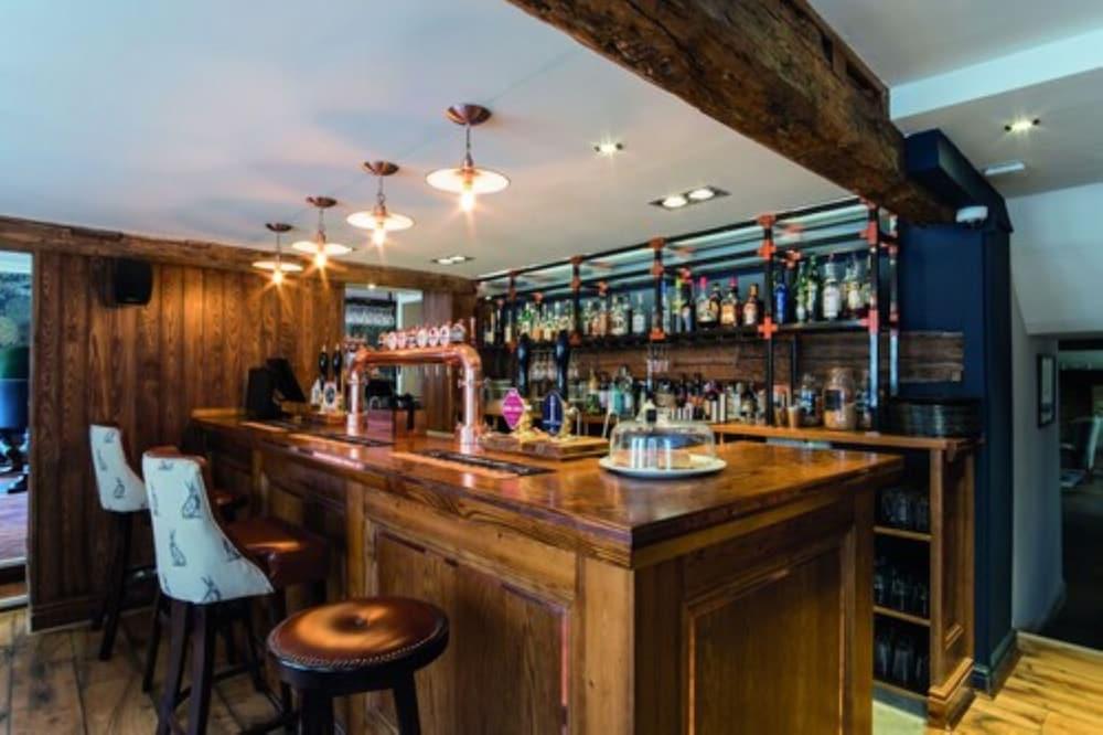 The Fleece At Cirencester Exterior foto The bar at The Old Dispensary