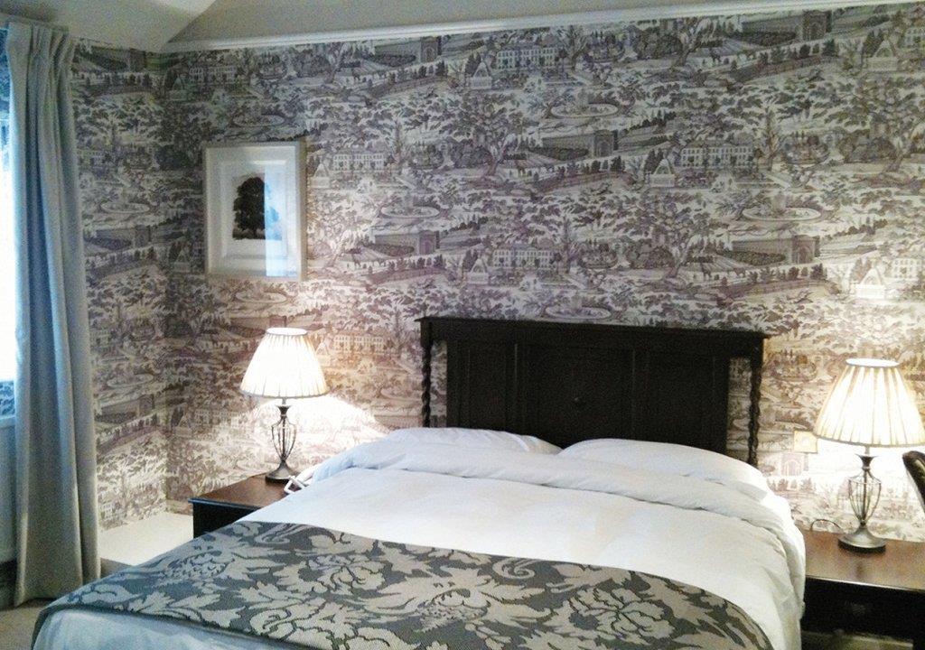 The Fleece At Cirencester Zimmer foto A bedroom at the hotel
